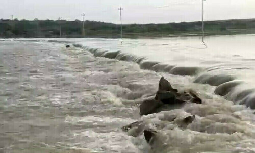 Two swept away in Karak flash flood