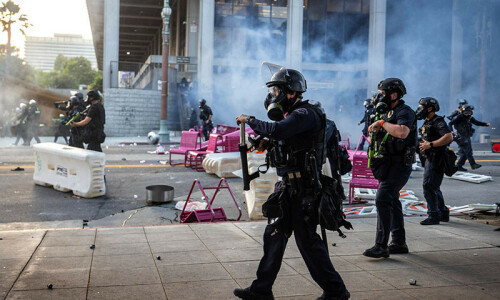 Los Angeles police order immigration protesters downtown to go home