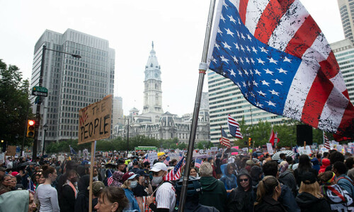 Tens of thousands of Americans join protest rallies ahead of Trump&rsquo;s military parade