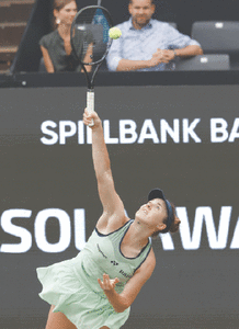 Swiatek cruises past second seed Paolini to reach first grass final