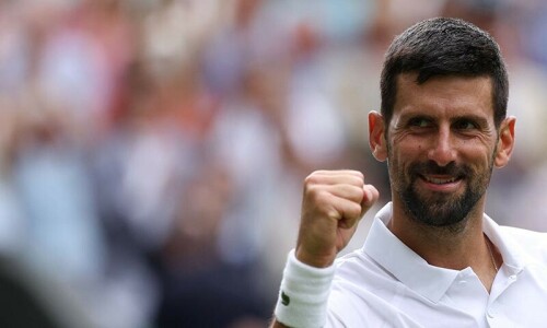 Djokovic survives scare to reach Wimbledon quarter-finals