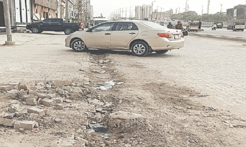 Karachi roads crumble as civic bodies pocket billions from SSGC