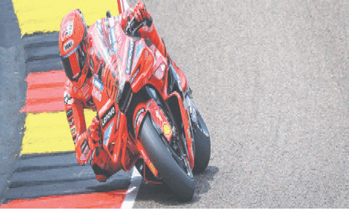 Marc Marquez clinches bruising German MotoGP