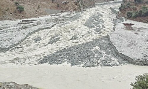 Floods sweep away bridge, road in Kohistan