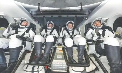 Four astronauts return to Earth from space station