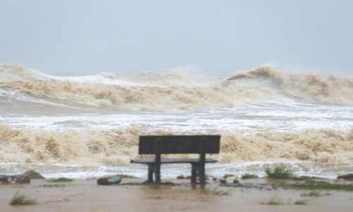 Trees down, homes flooded as typhoon batters Vietnam