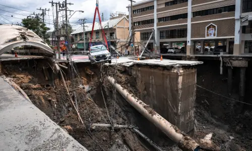 Massive sinkhole in Bangkok street forces evacuations