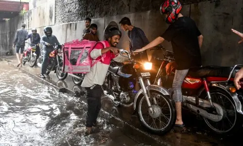 No rest for delivery riders amid Pakistan&rsquo;s monsoon downpours