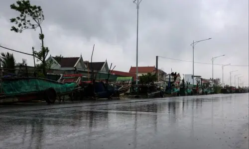 Vietnam evacuates thousands, shuts airports as Typhoon Bualoi nears