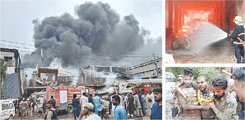 Four firefighters injured as huge blaze destroys garment factory Four firefighters injured as huge blaze destroys garment factory