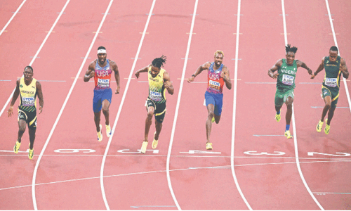Seville, Jefferson-Wooden storm to maiden 100m world titles Seville, Jefferson-Wooden storm to maiden 100m world titles