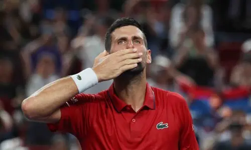 Djokovic &lsquo;hangs by rope&rsquo; before battling into Shanghai last 16