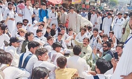 Protests held in KP districts against outsourcing of colleges