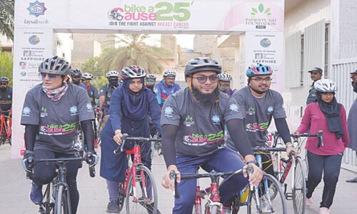 Cyclists pedal to raise awareness of breast cancer Cyclists pedal to raise awareness of breast cancer