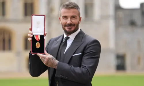 David Beckham knighted for services to sport and charity