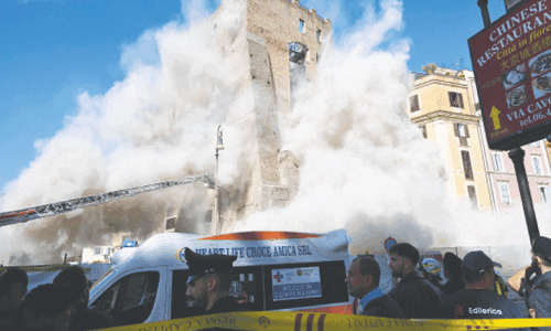 Mediaeval tower partially collapses in Rome, trapping worker Mediaeval tower partially collapses in Rome, trapping worker