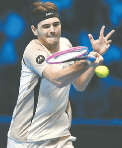 Fritz overpowers Musetti to start  with win at ATP Finals