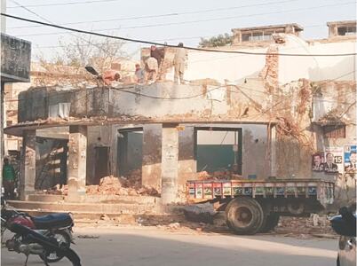 Parts of colonial-era building being demolished