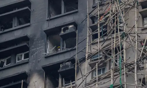 Hong Kong leader orders independent probe into fire that killed 151