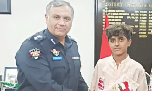 Police honour teenager who found body of child who drowned in open manhole in Karachi