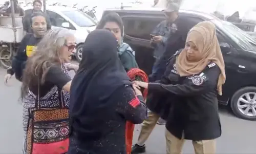 Police block routes to Karachi Press Club, detain activist ahead of Aurat March press conference