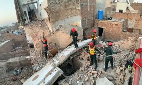 Blast damages structures in Nasirabad
