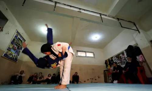 In a tiny hall far from Cairo, a club forges Egyptian girls&rsquo; Olympic wrestling dreams