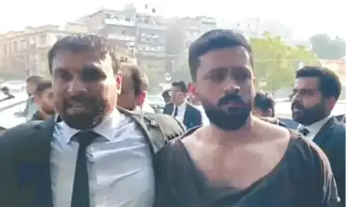 Lawyers stage sit-in after colleagues booked for &lsquo;assaulting&rsquo; YouTuber Rajab Butt