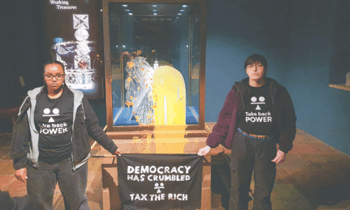 Four arrested after food thrown at Britain’s Crown Jewels Four arrested after food thrown at Britain’s Crown Jewels