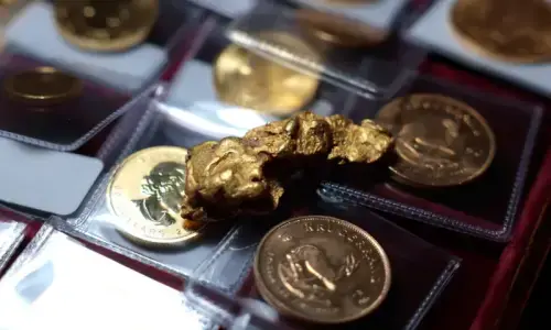 Gold, silver rise to near record highs on safe-haven demand