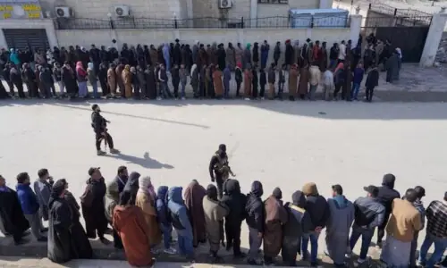 Syrian government, Kurdish forces announce integration deal