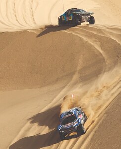   JJ-SPORT&rsquo;S Benyang Xu and Lei Tian, Ford Racing&rsquo;s Mattias Ekstrom and Emil Bergkvist in action during the Dakar Rally on Wednesday.&mdash;Reuters  