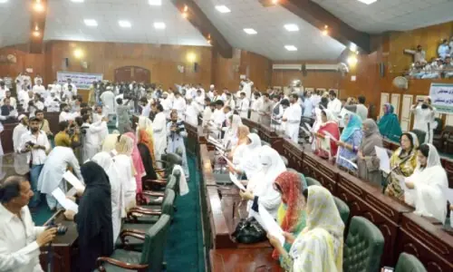 KP councillors stage sit-in to demand funds, powers