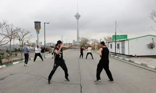 PHOTOS: Iranian men, women continue daily life in Tehran park PHOTOS: Iranian men, women continue daily life in Tehran park