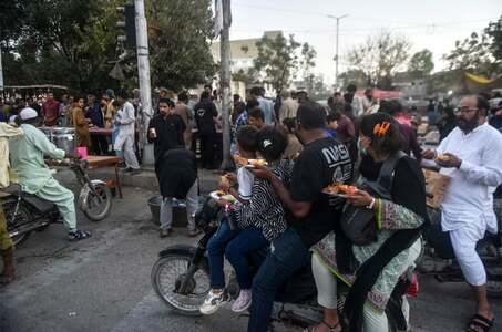 Prepared with devotion, roadside Iftar welcomes all