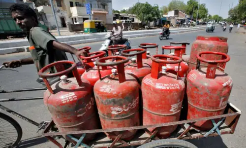Graveyard raid in India uncovers hidden cooking gas canisters amid shortage