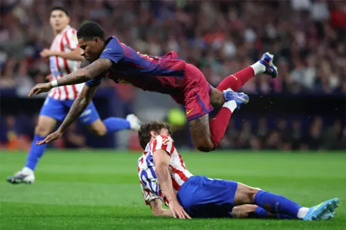 Barca beat 10-man Atletico to take major step towards title