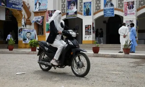 Soaring costs, fuel shortage fears drive Pakistan to electric motorbikes