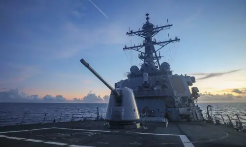 Missiles fired at US warship were 'warning shots', Iranian military says