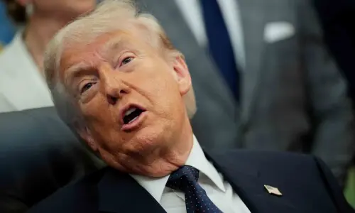 Trump pauses effort to escort ships in Strait of Hormuz, citing deal progress