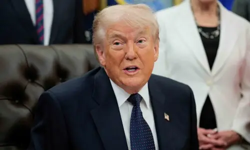 Trump pauses effort to escort ships in Strait of Hormuz, citing deal progress