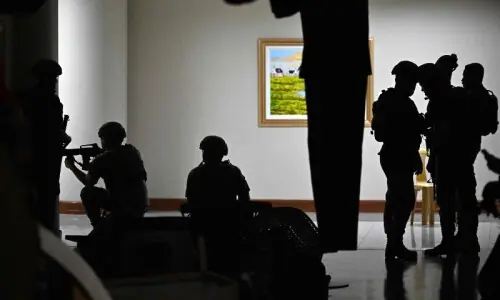 Gunshots fired in standoff at Philippine Senate over presence of ICC suspect