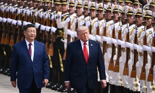 Trump and Xi meet for high-stakes talks in Beijing