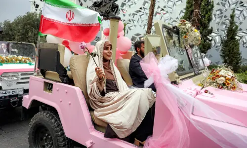 In pictures: Iran stages mass weddings for couples ready for war 'sacrifice'
