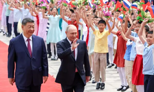 Putin, Xi hail 'unyielding' ties in China talks after Trump visit Putin, Xi hail 'unyielding' ties in China talks after Trump visit