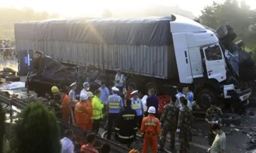 Passenger van accident kills 13 in central China