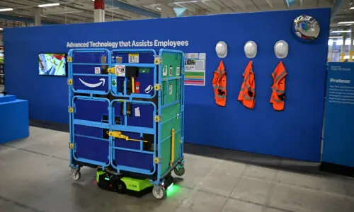 Amazon unveils robotic AI warehouse in UK