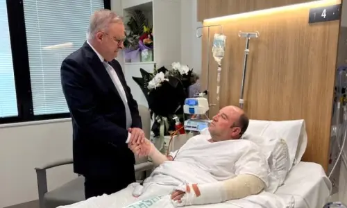 Bondi Beach hero charged with assaulting father