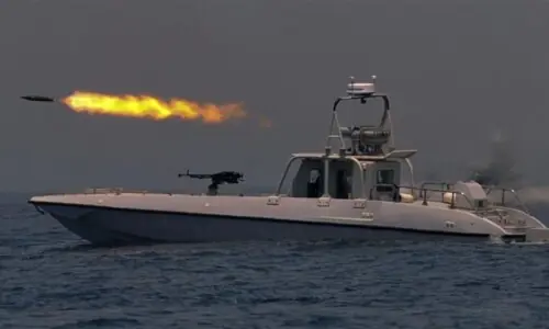 Iran says it fired warning missiles, drones at US warships in Gulf of Oman