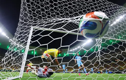 Munoz strike sends Colombia into knockouts, Ghana thwart England